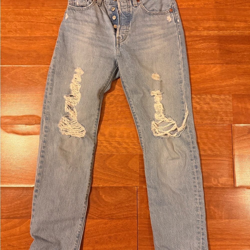 Distressed Light Blue Jeans